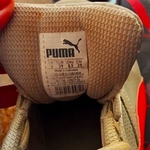 Women's Grey and Pink Puma 8.5 shoes